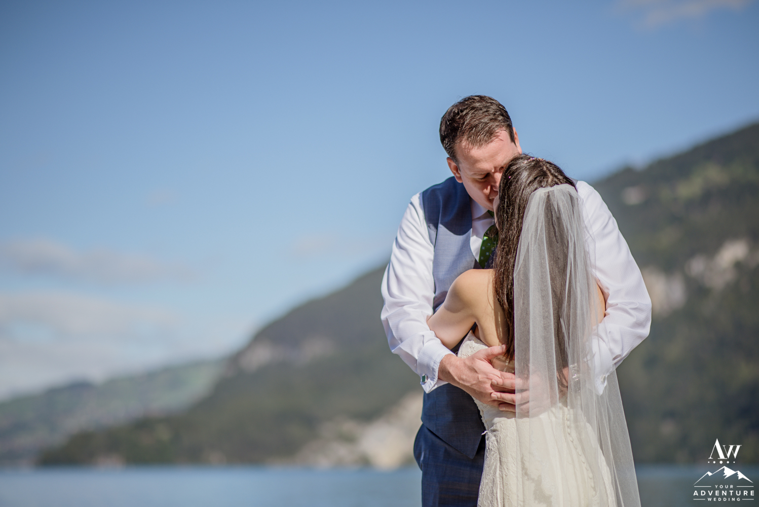Couple kissing in front of Interlaken Switzerland