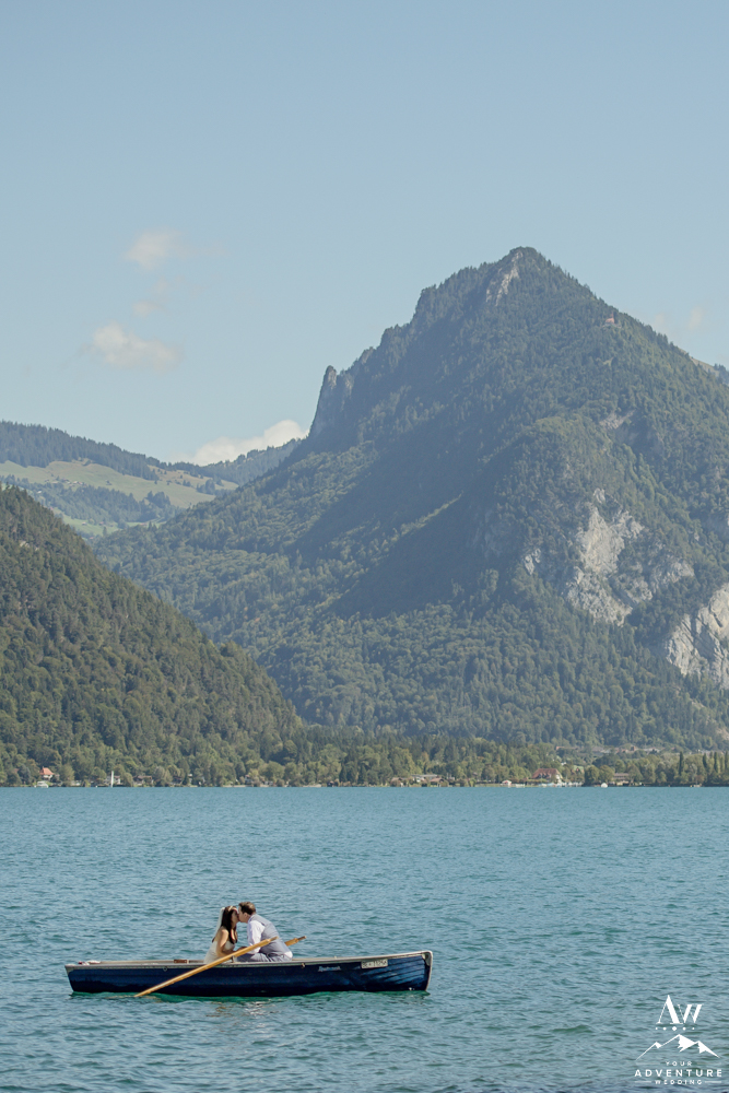 Bride and Groom in rowboat in Interlaken Switzerland