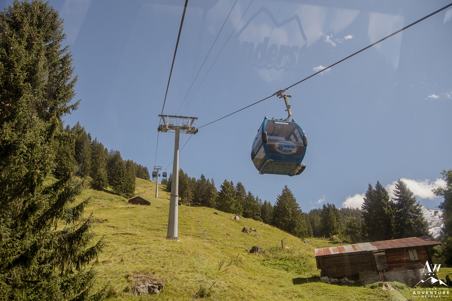 Wedding couple takes gondola up to oeschinensee