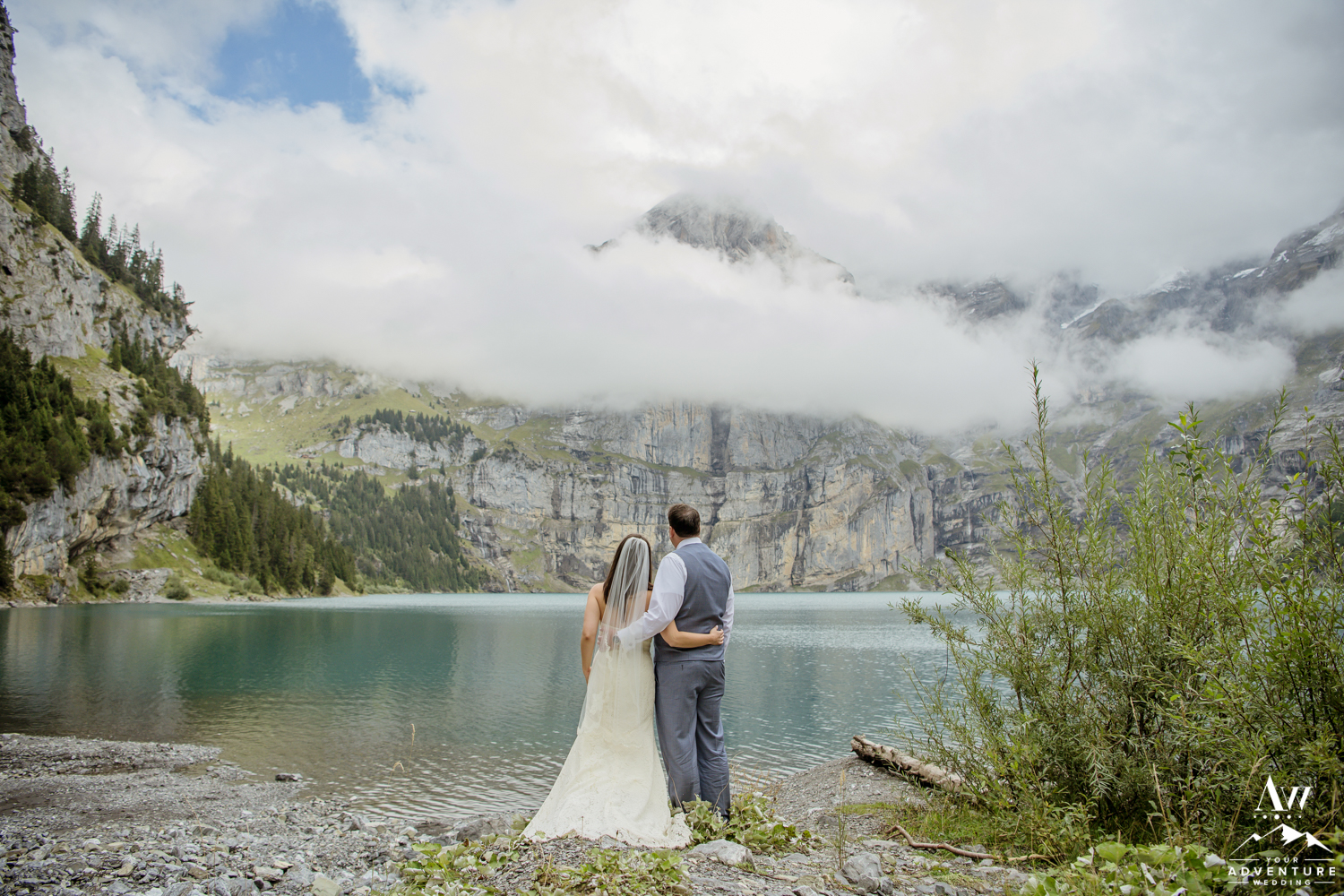 Couple looking out on oeschinensee lake