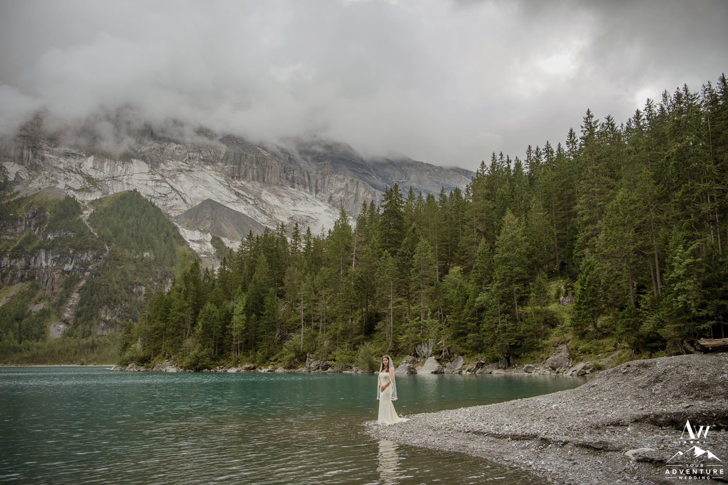 Bride looking out on oeschinensee lake