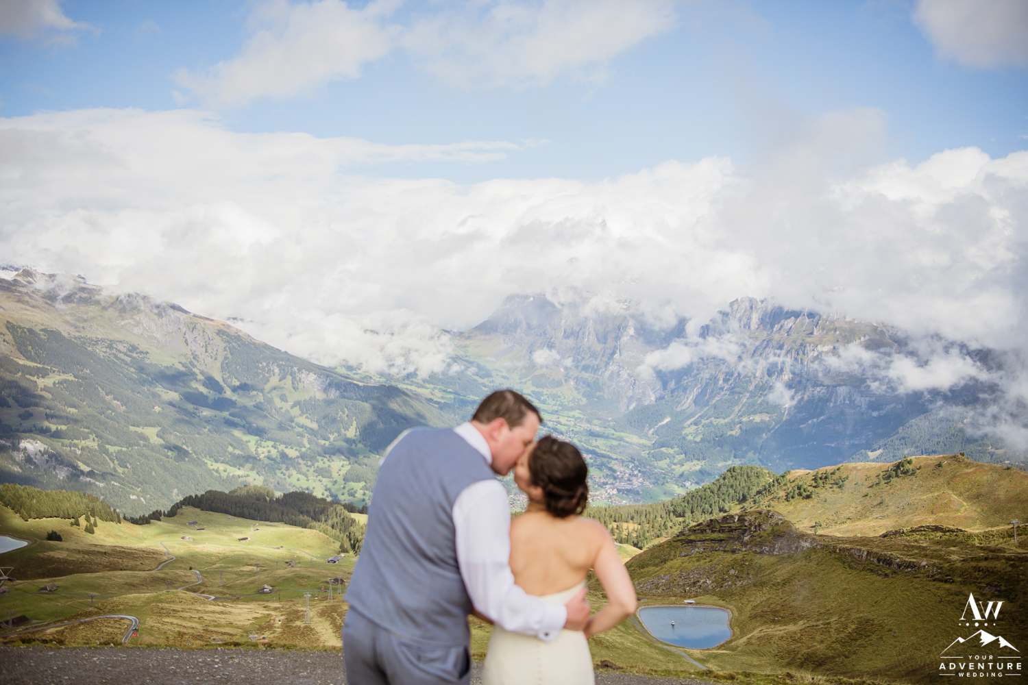 Switzerland wedding couple kissing on top of Männlichen