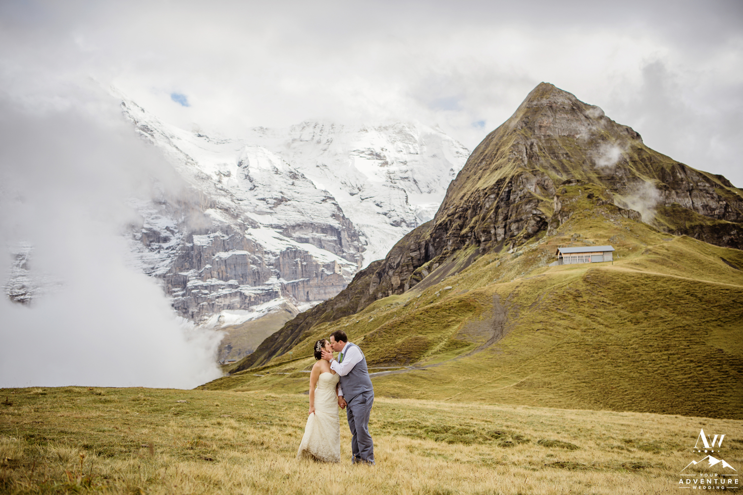 Switzerland Wedding Couple Kissing with Swiss Eiger Mountain Behind