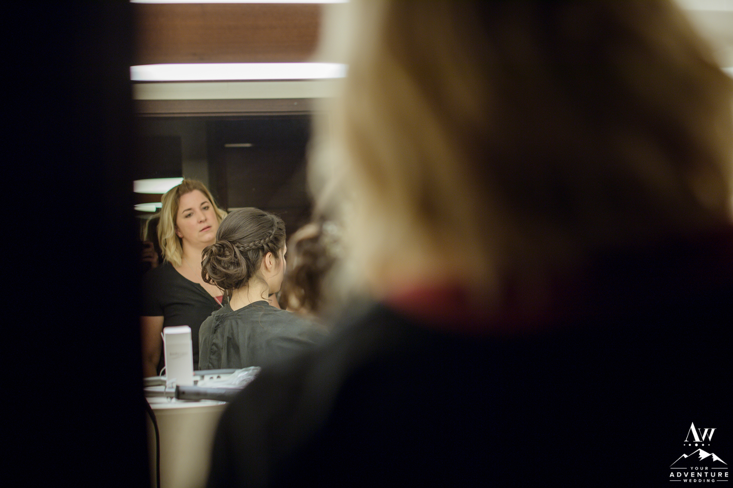 Switzerland bride checking out her makeup