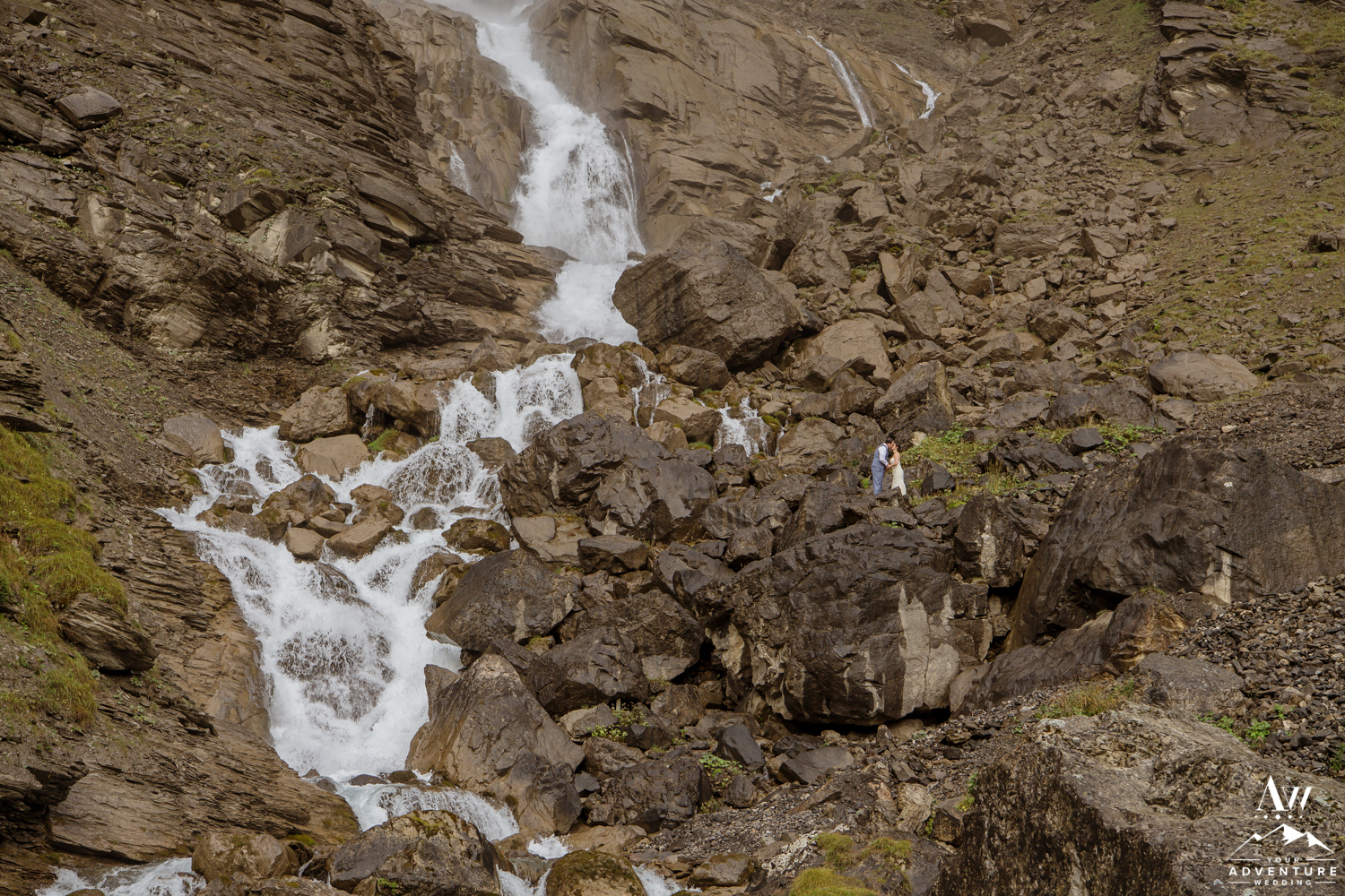 Switzerland Wedding Couple standing on top of Engstligenalp Waterfall