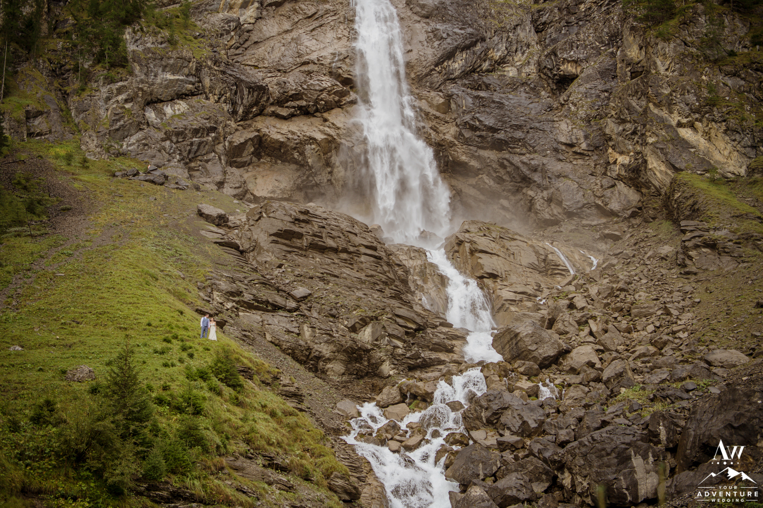 Switzerland Elopement Couple Exploring Engstligenalp Waterfall