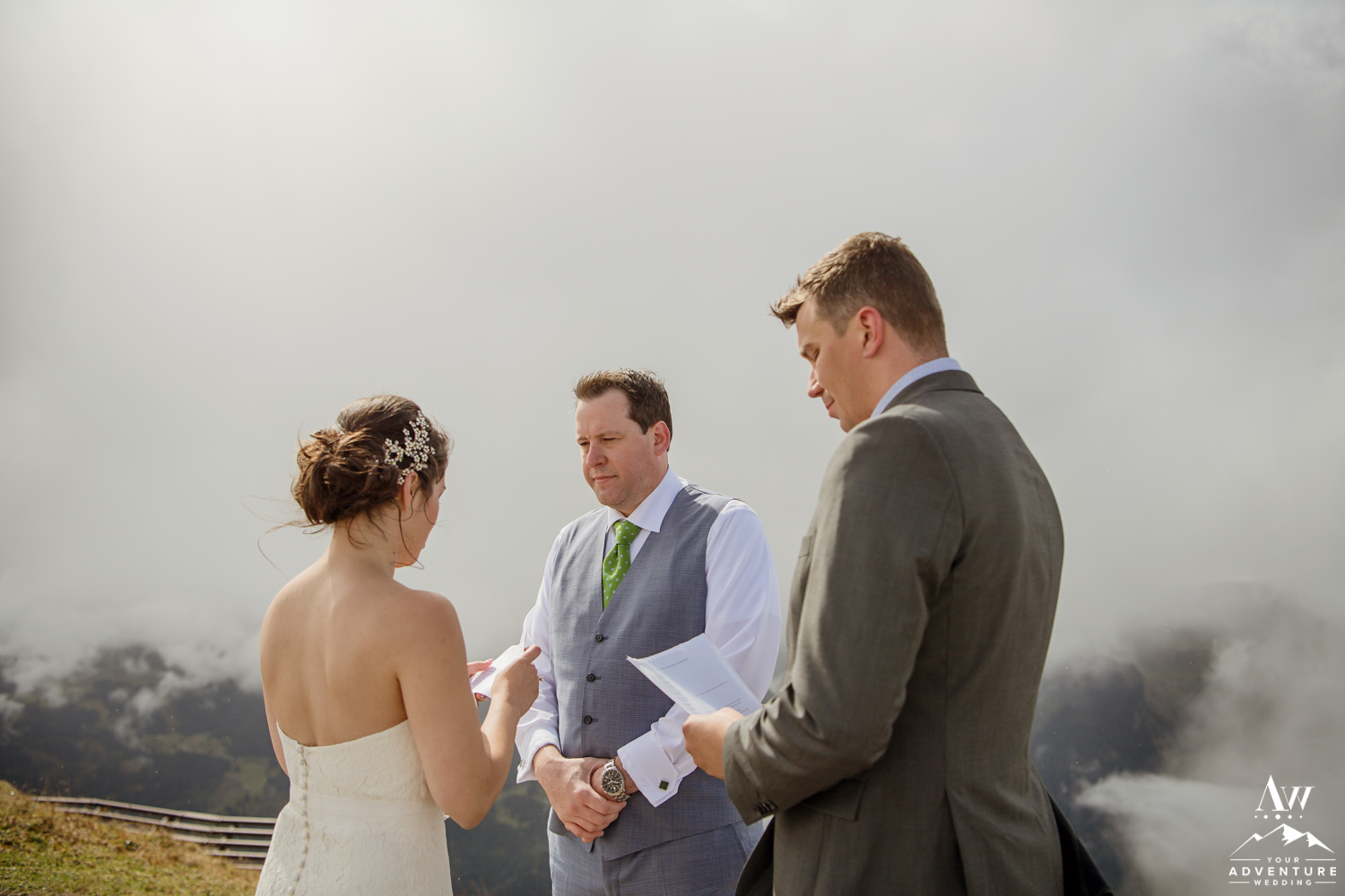 Couple reading their vows on top of Männlichen Mountain Wedding