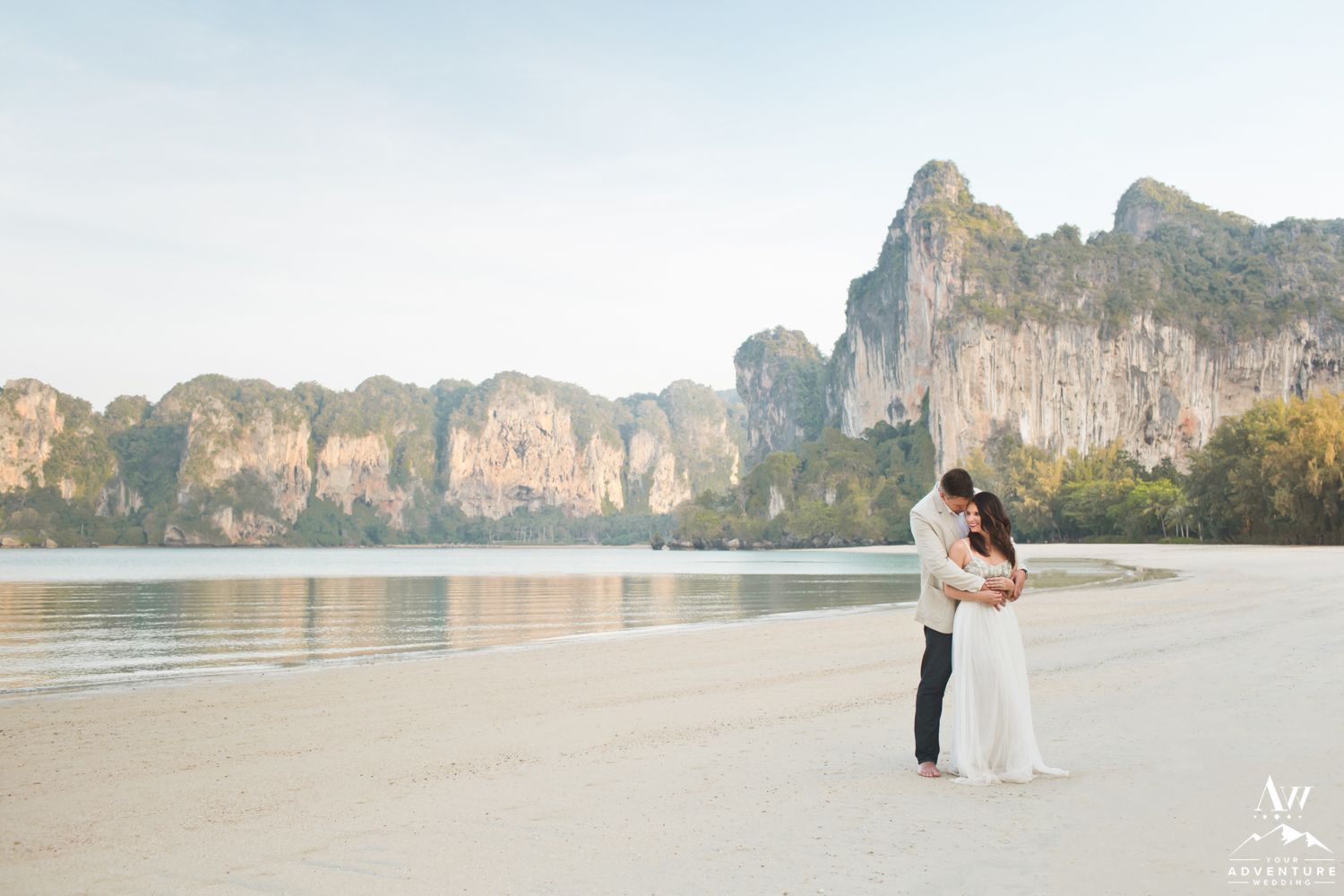 Railay Beach Wedding Couple cuddling on the beach