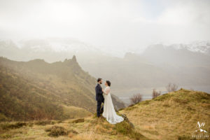 Couple Eloping on top of a mountain at sunrise