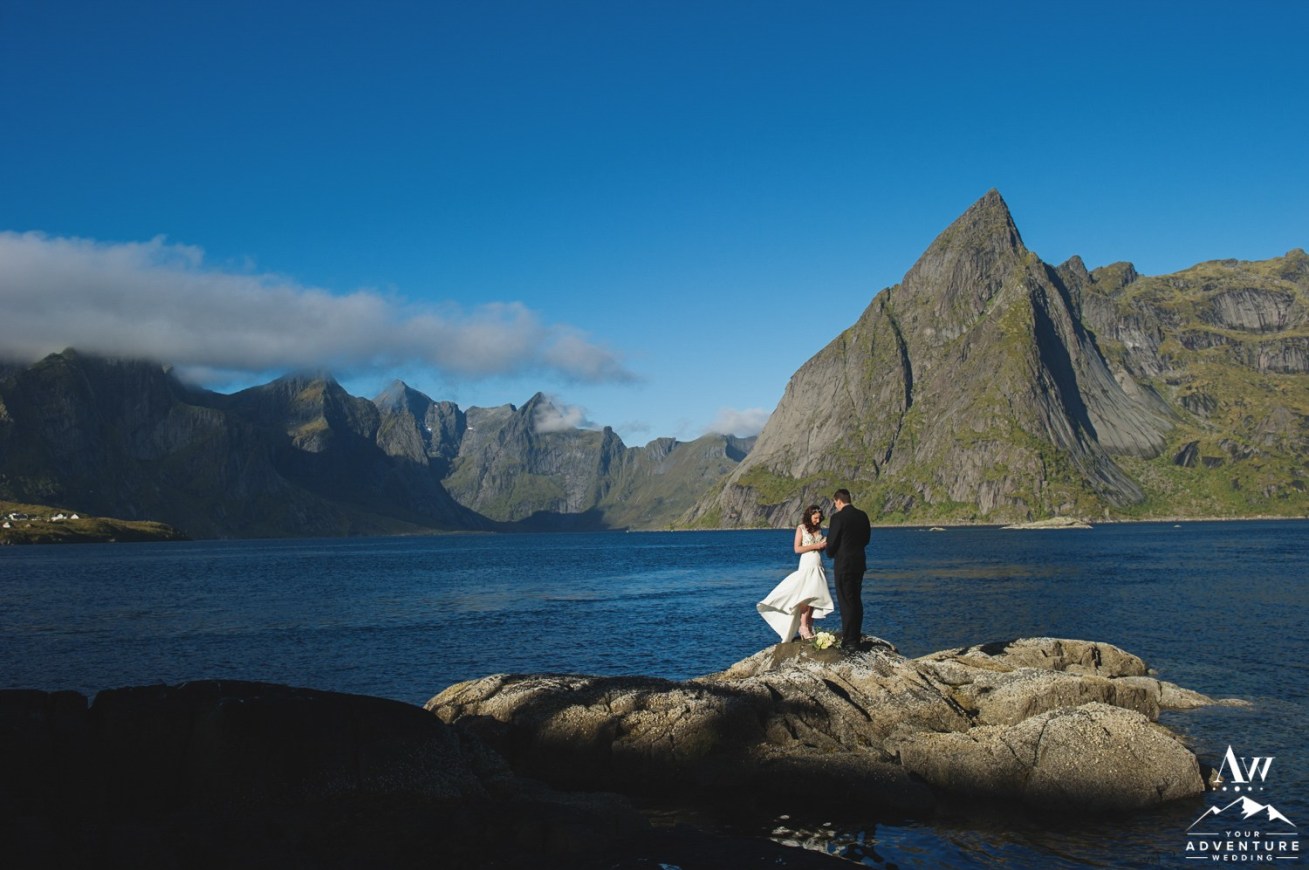 Couple eloping in front of a mountain in Lofoten Islands