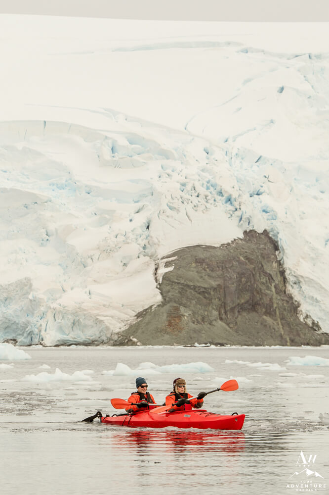 Antarctica elopement couple kayaking
