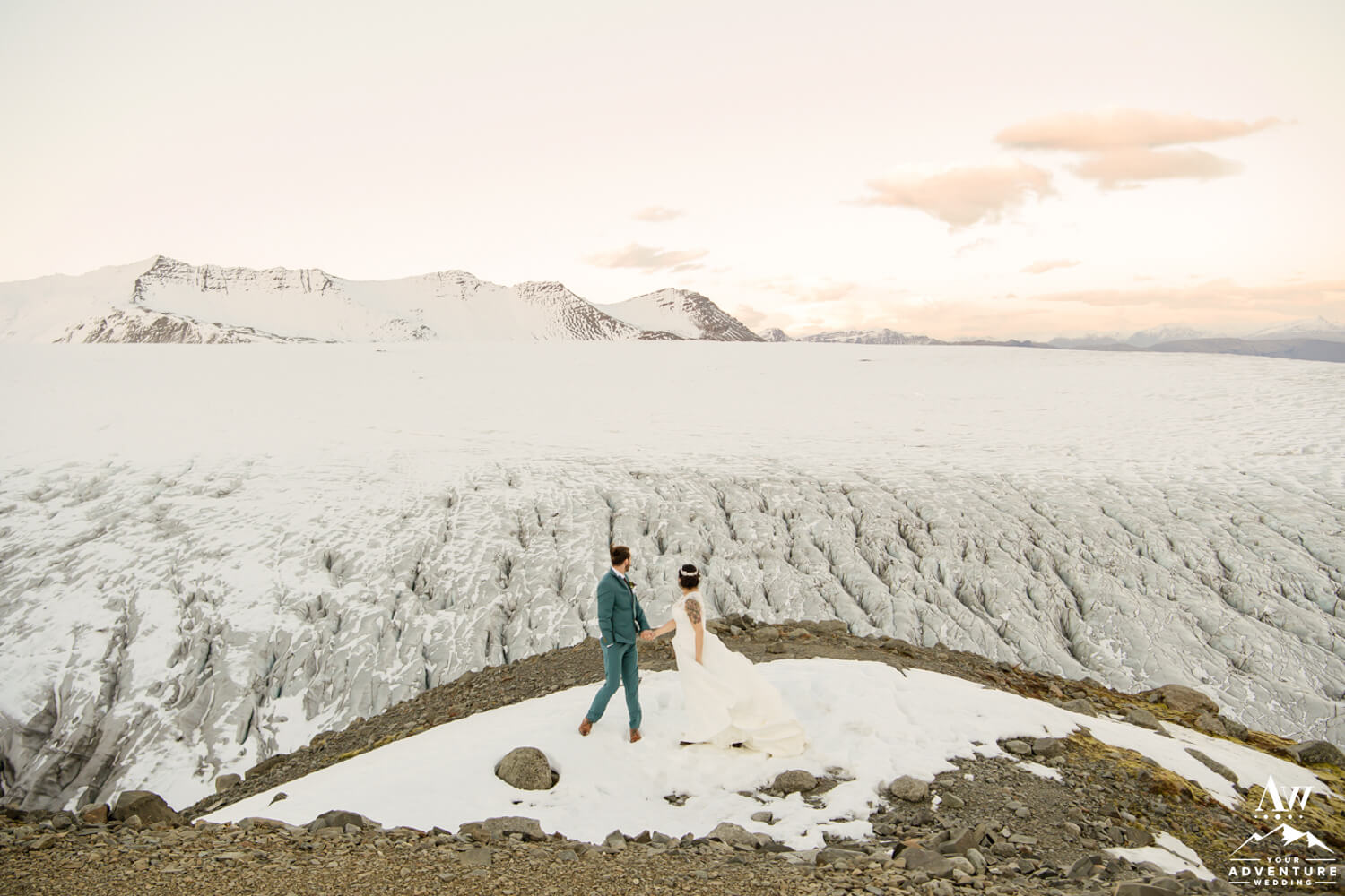 Iceland Elopement Couple Looking at a Glacier